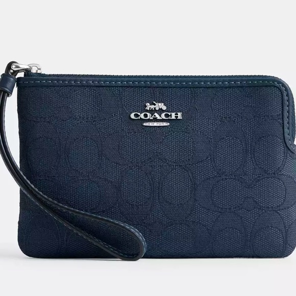 Coach CORNER ZIP WRISTLET IN SIGNATURE JACQUARD - Picture 1 of 3